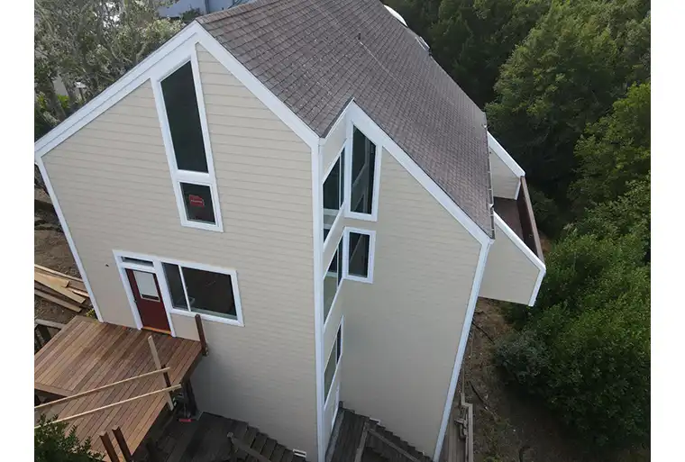 Deck being built on side of house